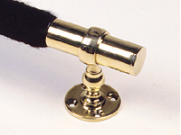 Wall end piece for rope barriers